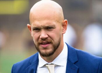 Harbaugh's Genius Coup: Minter's Protégé Returns as DC!