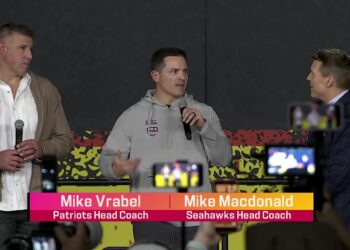 Rival Coaches Share Stage in Tense Super Bowl Showdown!