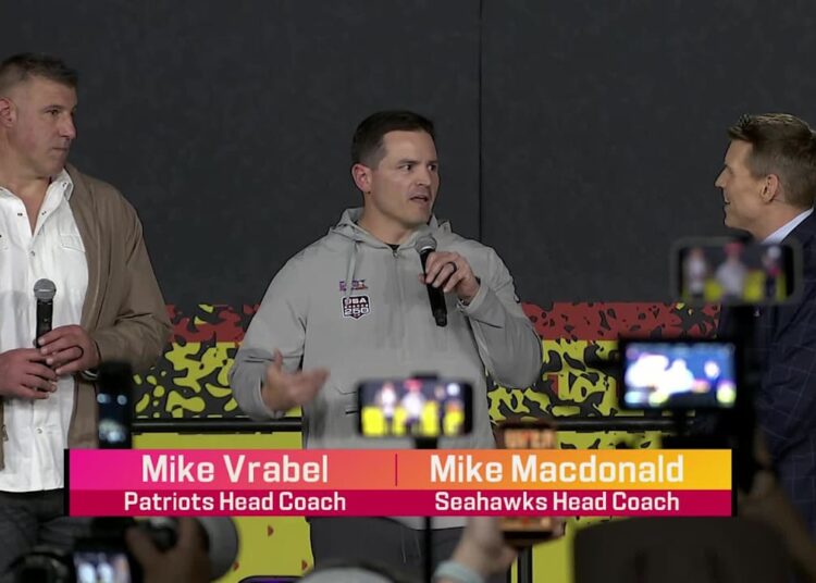 Rival Coaches Share Stage in Tense Super Bowl Showdown!